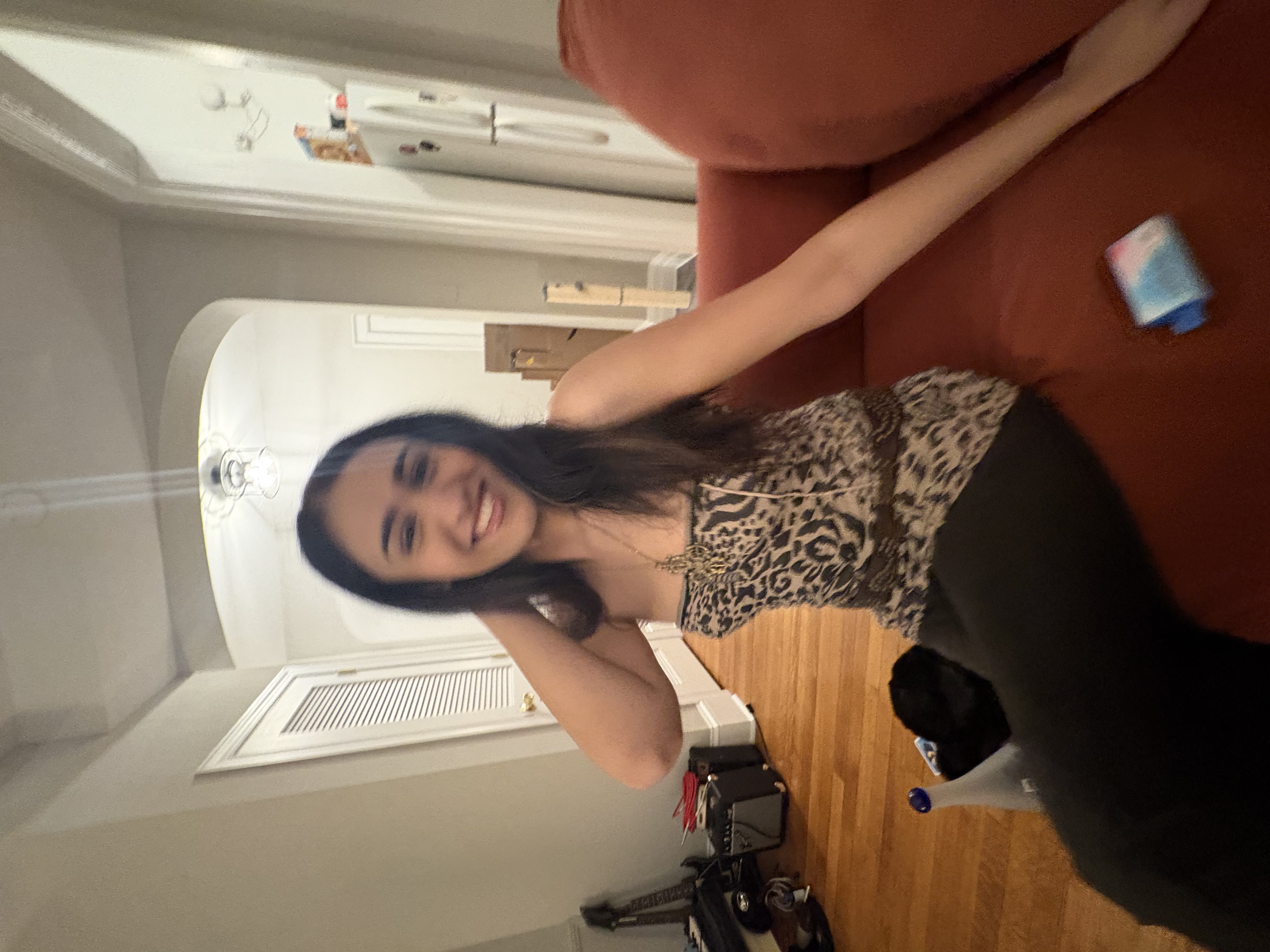 baddie in leopard mini dress and flared brown jeans with a cute belt