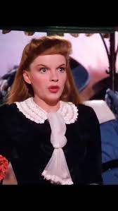 baddie in leopard mini dress and flared brown jeans with a cute belt